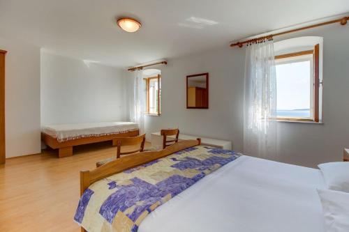 Postel nebo postele na pokoji v ubytování House Meri