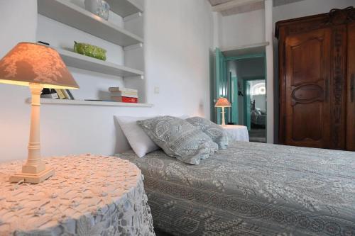 Ένα ή περισσότερα κρεβάτια σε δωμάτιο στο Galatea House First floor with terraces