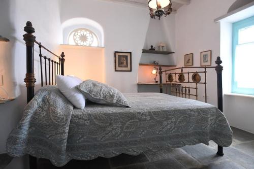 Ένα ή περισσότερα κρεβάτια σε δωμάτιο στο Galatea House First floor with terraces