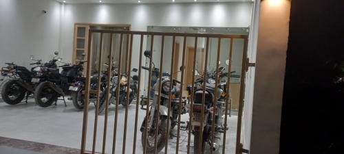 a room with a bunch of skis on display at KOZZY B&B in Amritsar