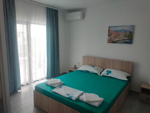 Кровать или кровати в номере Vila La Fernando