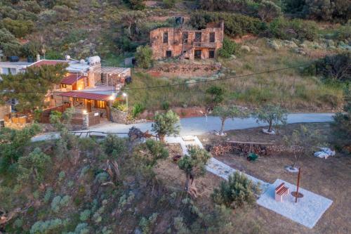an aerial view of a house on a hill at "PefkoPetro" Traditional House in Keramotí