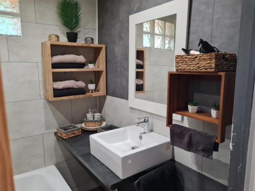 Kúpeľňa v ubytovaní La Maison des 4 moineaux