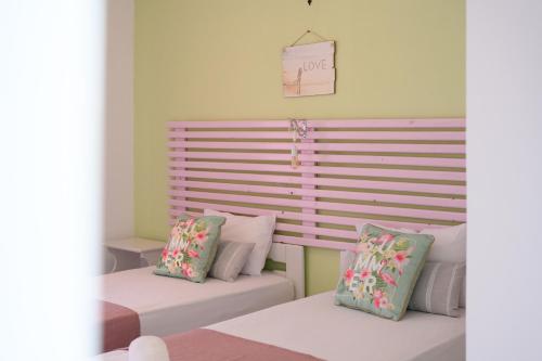 Postel nebo postele na pokoji v ubytování Harmony Corfu Apartments & Studios