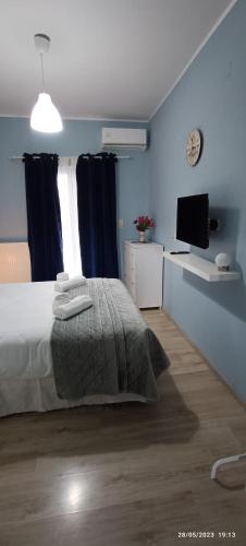 Postel nebo postele na pokoji v ubytování Marilidia House