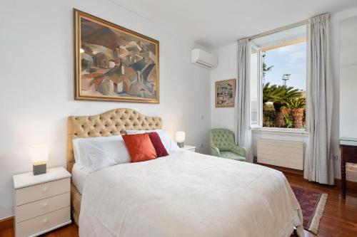 En eller flere senge i et værelse på Cycas Estate Corfu Town