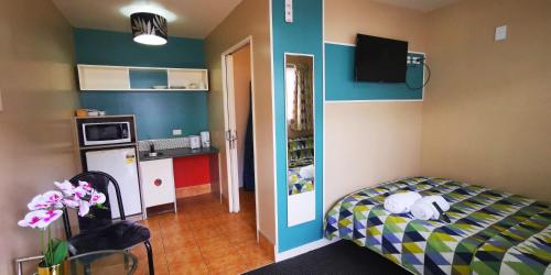 Η κουζίνα ή μικρή κουζίνα στο Astray Motel