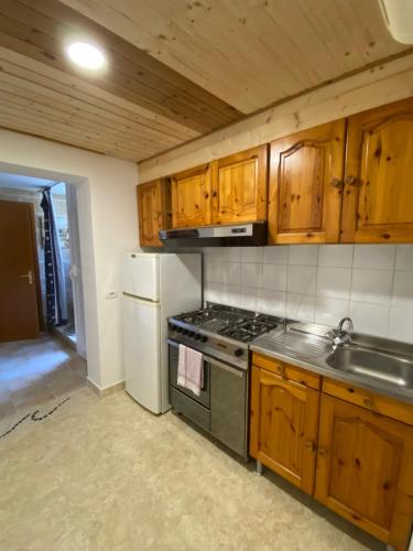 Kuchyň nebo kuchyňský kout v ubytování Casa Lara