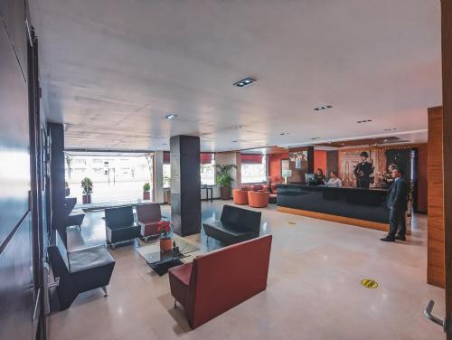 Posezení v ubytování Hotel Charlotte Suite 26