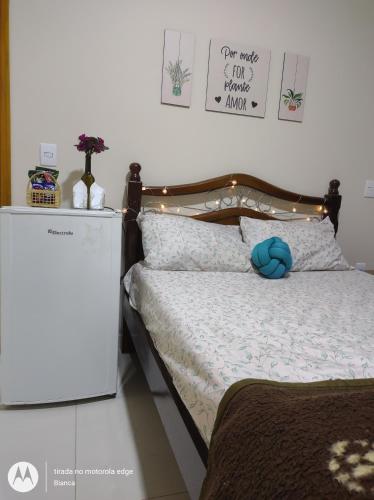 Postel nebo postele na pokoji v ubytování Nosso Canto Casa de Hóspedes