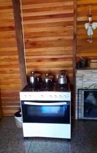 Dapur atau dapur kecil di Sítio pousada e Refúgio lazer e eventos