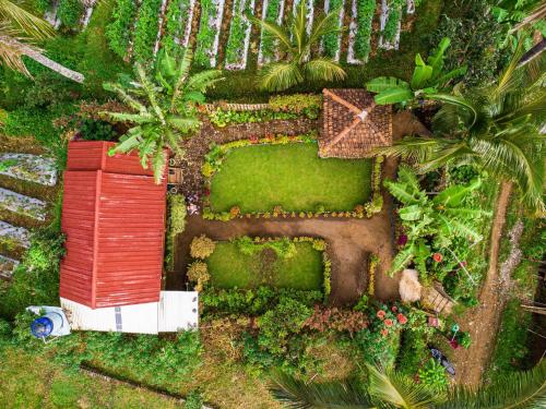 an overhead view of a garden with a house at Kurni's Cabin in Sapit
