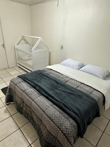 Krevet ili kreveti u jedinici u okviru objekta Casa Recanto Alegria