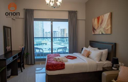 Fotografie z fotogalerie ubytování Business Bay Elite Tower Studio with Balcony and Burj Views 421, Pool, Jacuzzi, Steam Room, Sauna, Gym, Prayer Room, Grocery Delivery, Wifi, Fully Equipped, Free Parking, Running Track, Kids Play Area by Orion Short Stays v Dubaji