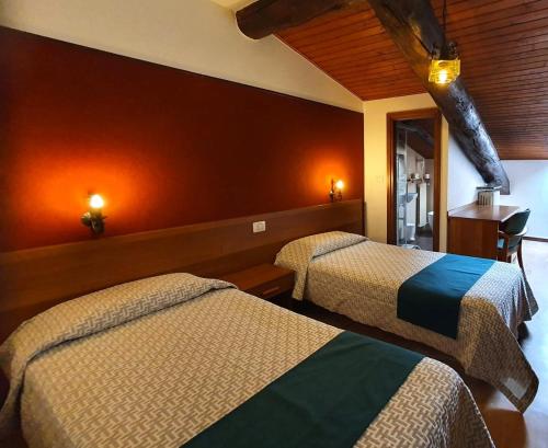 Una cama o camas en una habitación de Altavilla Albergo meublé