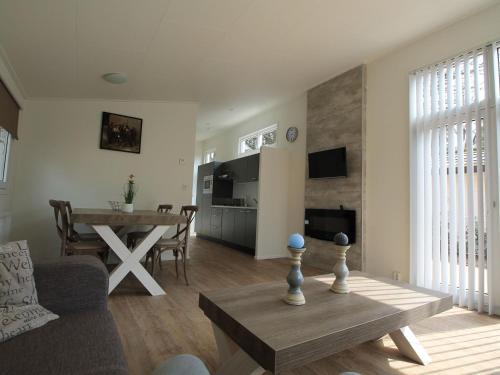 Neat chalet with dishwasher, surrounded by forest – Photos 3