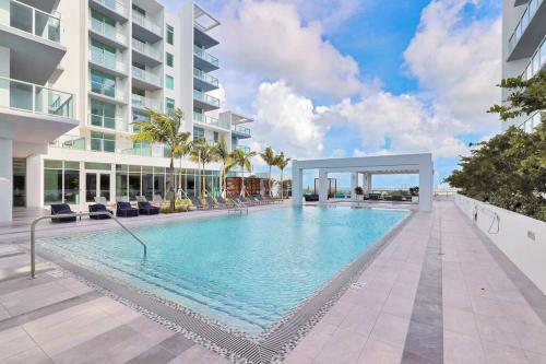 a swimming pool in the middle of a building at Miami design district, view of the bay - city in Miami