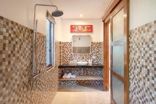 Phòng tắm tại Kandahill Bali