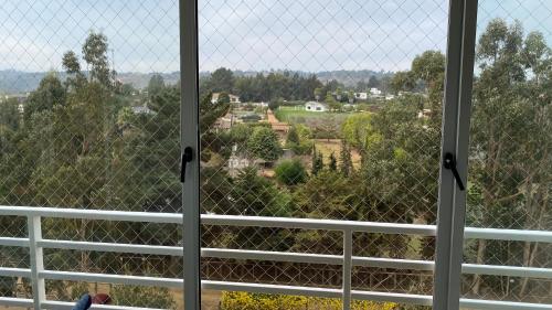 a view from a window with a fence at Hermoso y nuevo departamento en Algarrobo Norte in Algarrobo