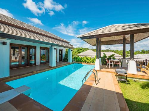 an image of a swimming pool in a villa at Villa Vigo with gym and tennis court in Koh Samui