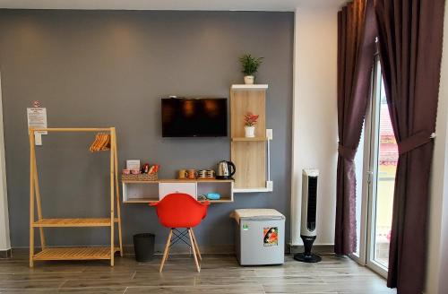 TV a/nebo společenská místnost v ubytování Ngô Gia Home