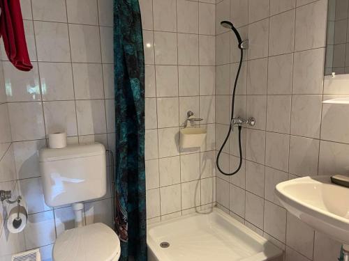 Ванная комната в Jurta Hotel Balatongyörök