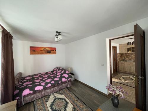 Giường trong phòng chung tại Acasa la Bunica, Cheile Turzii