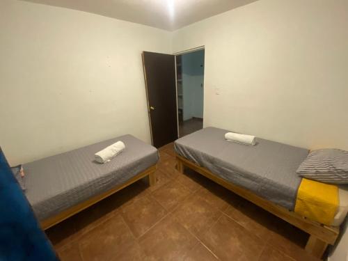 Uma cama ou camas num quarto em Casa Gn 37 Excellent Location North of the city Guaymas Sonora