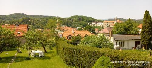 a view of a village with a table in a yard at Vila Hesha in Český Krumlov