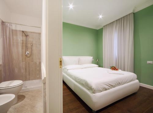 Voodi või voodid majutusasutuse The One Prati Rooms toas