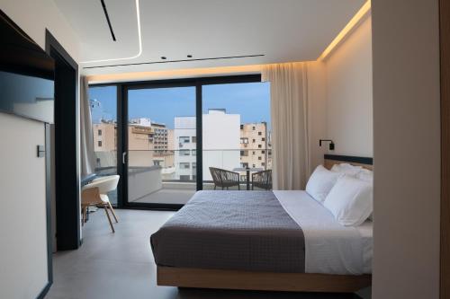 Postel nebo postele na pokoji v ubytování Nema Hotel Athens