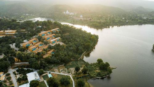 an aerial view of an island in the middle of a river at YAAN Udaipur in Udaipur