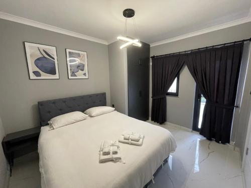 Posteľ alebo postele v izbe v ubytovaní Continental Trabzon Suite&Apartments