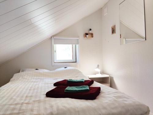 Postel nebo postele na pokoji v ubytování Kuorasjärven Kartano P&P