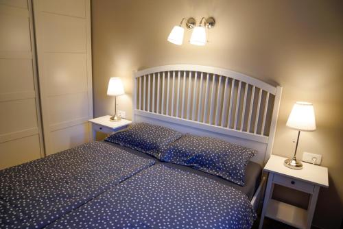 Postel nebo postele na pokoji v ubytování Kota27