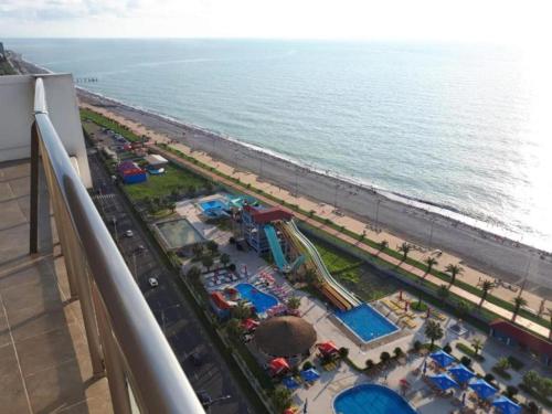 an aerial view of a water park on the beach at SeaGate in Batumi