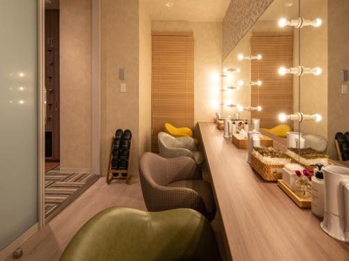 Area soggiorno di Super Hotel Premier Sendai Kokubuncho Tennenonsen