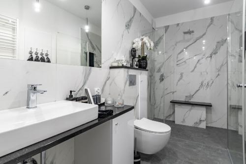 Koupelna v ubytování Apartamenty Glamour Giżycko