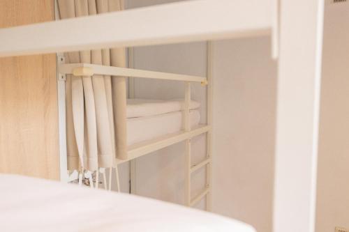 Postel nebo postele na pokoji v ubytování OwlStay Flip Flop Hostel - Garden