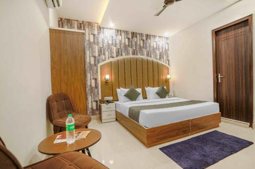 Ένα ή περισσότερα κρεβάτια σε δωμάτιο στο Hotel Paris Chandigarh Zirakpur