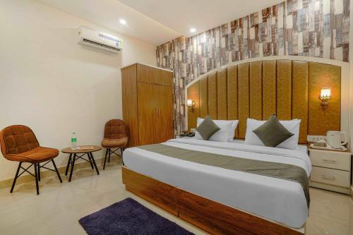 Ένα ή περισσότερα κρεβάτια σε δωμάτιο στο Hotel Paris Chandigarh Zirakpur