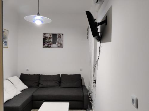 TV a/nebo společenská místnost v ubytování Sétány Apartman