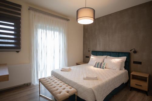 Letto o letti in una camera di Aerinos private villa