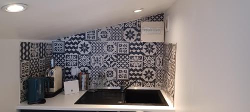 Η κουζίνα ή μικρή κουζίνα στο La Sardinière, Charmante maison dans un jardin