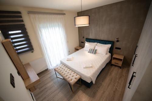 Letto o letti in una camera di Aerinos private villa