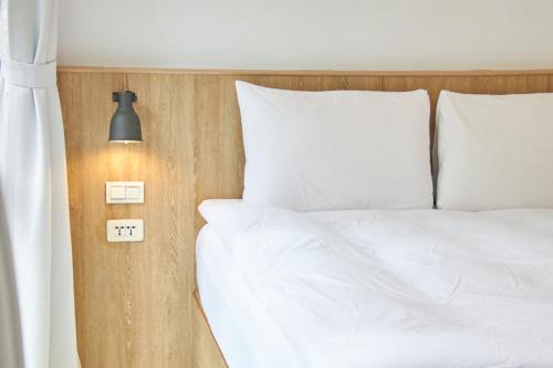 Postel nebo postele na pokoji v ubytování OwlStay Flip Flop Hostel - Garden
