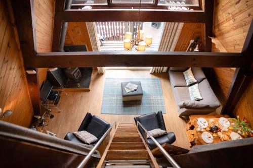 an overhead view of a living room in a house at Wolf Lodge in Carrbridge