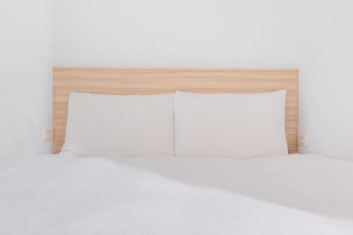 Postel nebo postele na pokoji v ubytování OwlStay Flip Flop Hostel - Garden