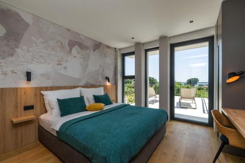 Giường trong phòng chung tại Villa Kathrin Istria