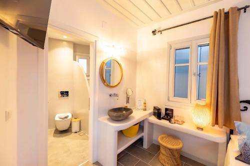 Ένα μπάνιο στο Kohylia Beach Guest House